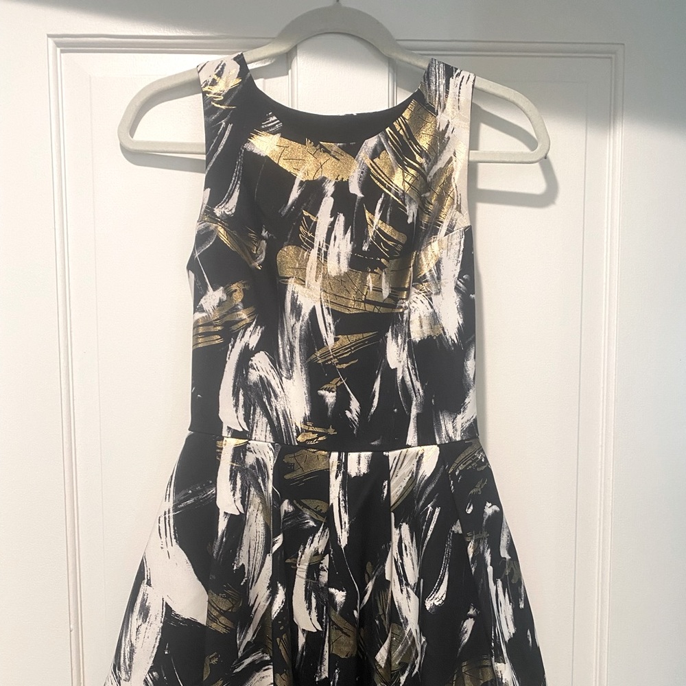 Metallic and black party dress from Aqua in size small.